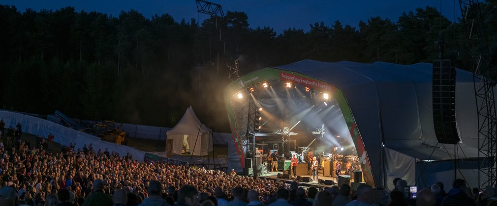 Paul Weller performing on stage at Cannock Chase