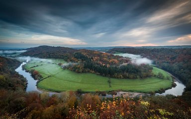 Sunrise over Symonds Yat with mist in the valley 